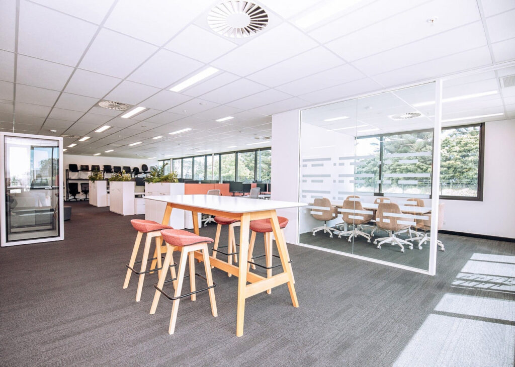 ACCO Auckland showroom with open-plan workstations, breakout seating and collaborative tables.