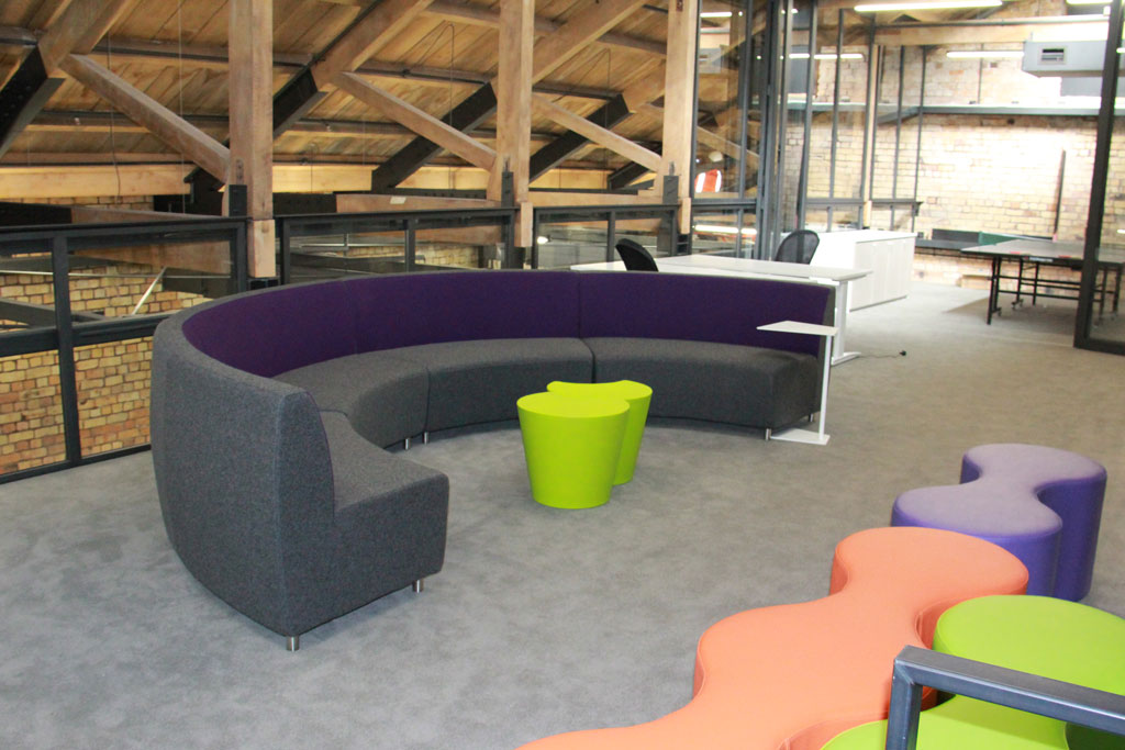 Informal collaboration area in the JUCY Auckland office
